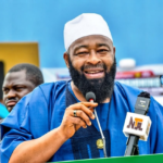 Governor Bago speaking on a podium